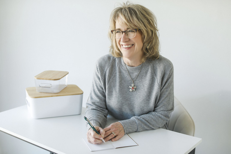 Joanie at Desk Writing a Strategy Plan